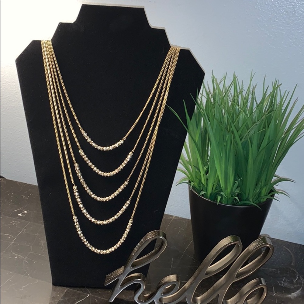 5 tier gold necklace with lil diamonds